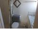 Small bathroom with toilet and sink at 29 Concord Ln # 11, Palm Harbor, FL 34684