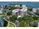 A premium waterfront condo complex with lush landscaping and stunning views of the Sarasota Bay area at 150 Belleview Blvd # 704, Belleair, FL 33756