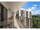 Spacious balcony with outdoor furniture, offering city views at 150 Belleview Blvd # 704, Belleair, FL 33756