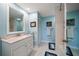 Clean bathroom with a tub shower combination and updated vanity at 150 Belleview Blvd # 704, Belleair, FL 33756