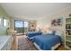 Second bedroom with two twin beds, hardwood floors and a view at 150 Belleview Blvd # 704, Belleair, FL 33756