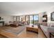 Spacious living room with hardwood floors and ample natural light at 150 Belleview Blvd # 704, Belleair, FL 33756