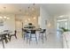 Open concept kitchen with island and breakfast bar at 15329 Aldama Cir, Port Charlotte, FL 33981