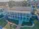 Aerial view featuring backyard, landscaping, and covered deck at 526 Belle Isle Ave, Belleair Beach, FL 33786
