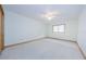 Spacious bedroom features a window, closet and light colored carpet perfect for relaxation and comfort at 526 Belle Isle Ave, Belleair Beach, FL 33786