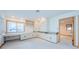 Bright bonus room features a built-in desk and ample storage cabinets providing organization and functionality at 526 Belle Isle Ave, Belleair Beach, FL 33786