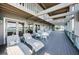 Waterfront deck with outdoor seating and lounge chairs to take in the beautiful views at 526 Belle Isle Ave, Belleair Beach, FL 33786