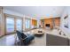Cozy living room features a water view, built-in bookshelves, and ample seating at 526 Belle Isle Ave, Belleair Beach, FL 33786