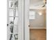 Bedroom with wood-look floors and palm-tree door at 3353 Columbus Dr, Holiday, FL 34691