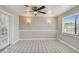 Breakfast nook with brick accent wall and tile flooring at 3353 Columbus Dr, Holiday, FL 34691