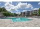 Inviting community pool with a spacious deck at 6550 Shoreline Dr # 7101, Seminole, FL 33708