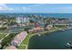 Aerial view of waterfront condo building with boat slips and a swimming pool at 2775 Kipps Colony S Dr # 204, St Petersburg, FL 33707