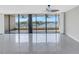 Living room with tile floors and stunning water views at 2775 Kipps Colony S Dr # 204, St Petersburg, FL 33707