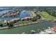 Aerial view of waterfront condo building with boat slips and a swimming pool at 2775 Kipps Colony S Dr # 204, St Petersburg, FL 33707