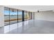 Living room with water views and tile floors at 2775 Kipps Colony S Dr # 204, St Petersburg, FL 33707