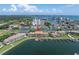 Aerial view of waterfront condo building with boat slips and a swimming pool at 2775 Kipps Colony S Dr # 204, St Petersburg, FL 33707