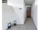 Condo entry with tile flooring and decorative accents at 2775 Kipps Colony S Dr # 204, St Petersburg, FL 33707