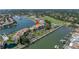 Aerial view of waterfront condo building with boat slips and a swimming pool at 2775 Kipps Colony S Dr # 204, St Petersburg, FL 33707