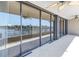 Balcony with sliding glass doors offering water views at 2775 Kipps Colony S Dr # 204, St Petersburg, FL 33707