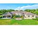 Community clubhouse with covered patio and landscaped grounds at 10426 48Th E Ct, Parrish, FL 34219
