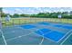 Outdoor basketball and multi-purpose court with defined playing areas at 10426 48Th E Ct, Parrish, FL 34219