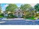 Community center with stone facade and landscaping at 10426 48Th E Ct, Parrish, FL 34219