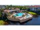 Resort-style pool and spa overlooking a lake at 17B Franklin S Ct, St Petersburg, FL 33711