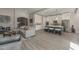 Modern kitchen with island, stainless steel appliances, and white cabinets at 17B Franklin S Ct, St Petersburg, FL 33711