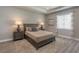 Bedroom with gray furniture and a large window at 17B Franklin S Ct, St Petersburg, FL 33711
