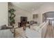 Living room features a sectional sofa and large TV at 17B Franklin S Ct, St Petersburg, FL 33711