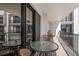 Private balcony with outdoor table and chairs at 150 Belleview Blvd # 704, Belleair, FL 33756