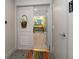 Inviting condo entryway with decorative basket at 150 Belleview Blvd # 704, Belleair, FL 33756