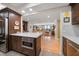 Modern kitchen with stainless steel appliances and a large island at 150 Belleview Blvd # 704, Belleair, FL 33756
