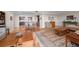Spacious living room with hardwood floors and ample natural light at 150 Belleview Blvd # 704, Belleair, FL 33756