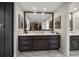 Modern bathroom with a double vanity and marble countertops at 150 Belleview Blvd # 704, Belleair, FL 33756