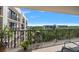 Relaxing balcony with potted plants and city view at 150 Belleview Blvd # 704, Belleair, FL 33756