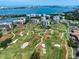 Aerial view of upscale community with golf course and waterfront access at 150 Belleview Blvd # 704, Belleair, FL 33756