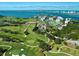 Aerial view of golf course and waterfront community at 150 Belleview Blvd # 704, Belleair, FL 33756