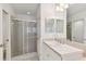 Bathroom with shower, single vanity and mirrored medicine cabinet at 2848 Bayshore Trails Dr, Tampa, FL 33611
