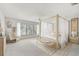 Main bedroom with a canopy bed and plenty of natural light at 2848 Bayshore Trails Dr, Tampa, FL 33611