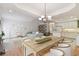 Elegant dining area with hardwood floors and a stylish chandelier at 2848 Bayshore Trails Dr, Tampa, FL 33611