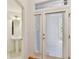 Small powder room with pedestal sink and tiled floor at 2848 Bayshore Trails Dr, Tampa, FL 33611