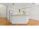 Modern kitchen featuring white cabinets and an island at 2848 Bayshore Trails Dr, Tampa, FL 33611