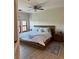 Spacious main bedroom with a large platform bed and plenty of natural light at 2746 Via Tivoli # 132B, Clearwater, FL 33764