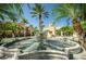 Grand entrance to community with fountain and gated access at 2746 Via Tivoli # 132B, Clearwater, FL 33764