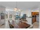 Open concept living and kitchen area with a spacious dining area at 2746 Via Tivoli # 132B, Clearwater, FL 33764
