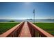Wooden deck extending to the waterfront at 2746 Via Tivoli # 132B, Clearwater, FL 33764