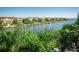 Waterfront view with boats and lush landscaping at 2746 Via Tivoli # 132B, Clearwater, FL 33764