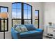 Cozy sitting area with a blue couch and views at 2746 Via Tivoli # 132B, Clearwater, FL 33764