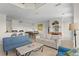 Living room with sofas, coffee table and fireplace at 2746 Via Tivoli # 132B, Clearwater, FL 33764